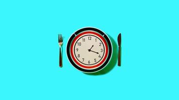 Clock with hands on plate with fork and knife on turquoise video