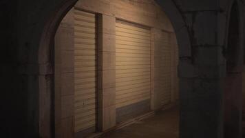 Store door and windows closed with shutters on embankment video