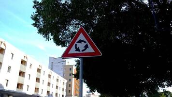 Triangular road sign instruct drivers move Roundabout video