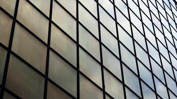 Modern business center mirror windows with reflected clouds video