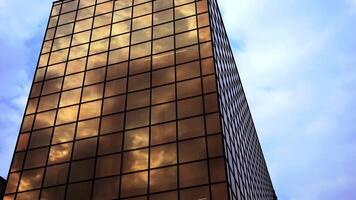 Large modern square building with dark brown mirror windows video