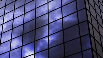 Changing color of dense clouds reflecting in modern building video