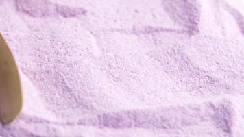 Pink matcha latte texture. Taro latte with coconut creamer and sugar texture, slow motion video