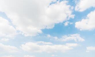 A blue sky with clouds and a few clouds photo