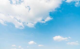 A blue sky with clouds and a few clouds photo