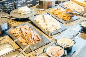 A buffet with various foods on it photo