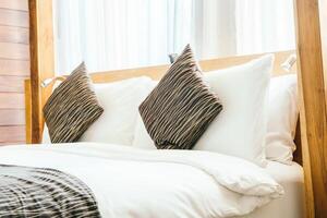 A bed with white sheets photo