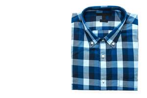 A blue and white checkered shirt on a white background photo