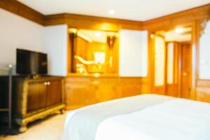 A bedroom with a bed and a tv photo
