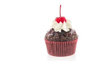 A cupcake with a cherry on top photo