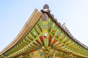 A colorful roof with a large statue of a horse photo