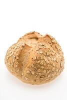 A loaf of bread with seeds on it photo