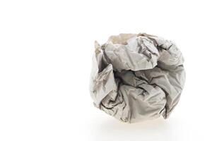 A pile of paper on a white surface photo