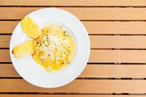 A plate of food on a table photo