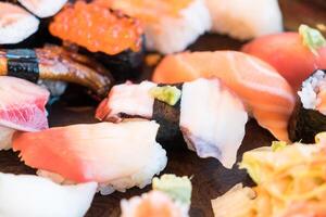 A plate of sushi with different types of fish photo