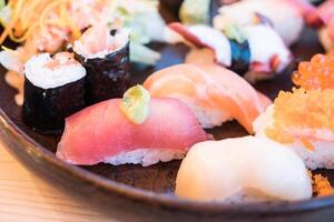 A plate of sushi with different types of sushi photo