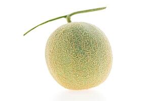A single green melon on a white background photo
