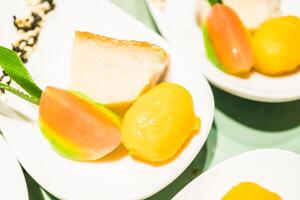 A table with a bunch of plates with different food photo