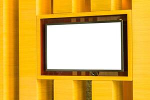 A television mounted on a wall with a blank screen photo