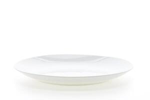 A white bowl on a white surface photo