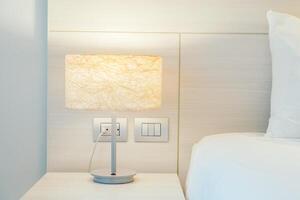 White bed with white sheets photo