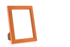 A picture frame with an orange frame on a white background photo