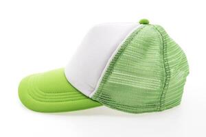 A green and white baseball cap with mesh on the front photo