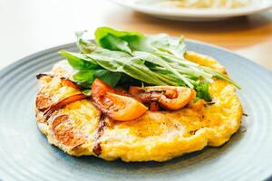 A plate of food with a salad on it photo