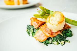 A plate with food on it and a fork photo