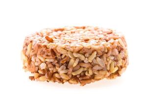 A piece of brown rice on a white background photo