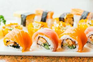 A plate with sushi rolls on it photo