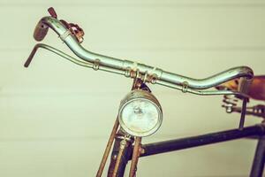 An old bicycle with a light on it photo