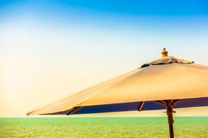 An umbrella on a beach photo