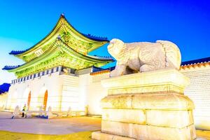A statue of a lion in front of a building photo