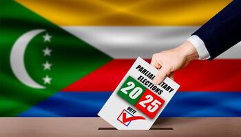 Hand holding ballot in voting ballot box with Comoran flag in background. Comoran parliamentary elections photo