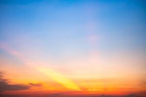 Beautiful , luxury soft gradient orange gold clouds and sunlight on the blue sky perfect for the background, take in everning,Twilight, Large size, high definition landscape photo