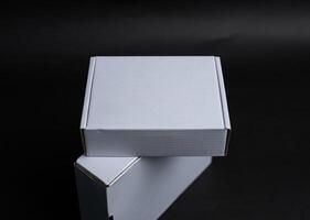 Two boxes stacked on top of each other The top box is slightly offset photo