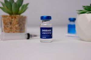 Disease vaccine on the table, healthcare clinic, hospital. health and medical concepts photo