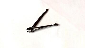 Metal Nail Clipper on White Background, Manicure, Pedicure Tool photo