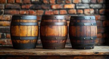 Three barrels of different colors are lined up on a wooden table. The barrels are made of wood and have a rustic appearance. The scene gives off a warm and cozy feeling photo