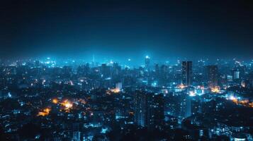 A city at night with lights on the buildings photo