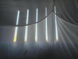 a closeup shot of a white mosquito net photo