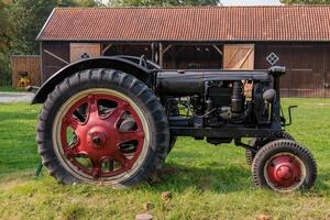A black and red tractor photo