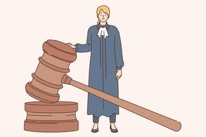 Woman judge stands near large gavel to make fair decisions, wearing black robe. vector