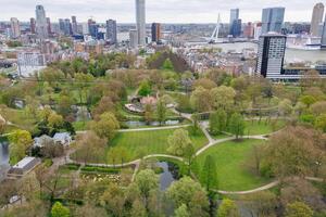 A park with trees and a river in rotterdam photo