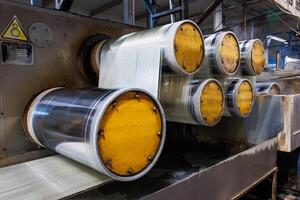 Mechanical Symphony Industrial Rollers Dance to the Rhythm of Material Transformation Understeely Precision. photo