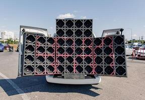 Rhythm on Wheels A van equipped with booming speakers stands ready to bring the beat to the streets, merging mobility with a pulse of vibrant sound. photo