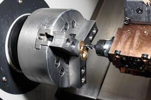 Precision unleashed A CNC machine meticulously shaping a raw metal piece, transforming it into a flawless masterpiece with rhythmic precision and industrial grace. photo