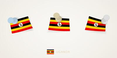 Pinned flag of Uganda in different shapes with twisted corners. pushpins top view. vector