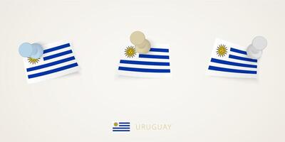 Pinned flag of Uruguay in different shapes with twisted corners. pushpins top view. vector